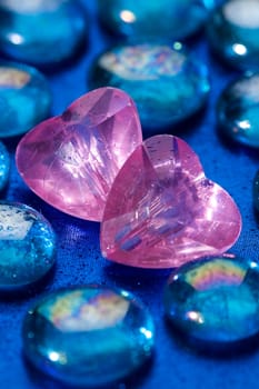The pink crystal heart on the blue glass