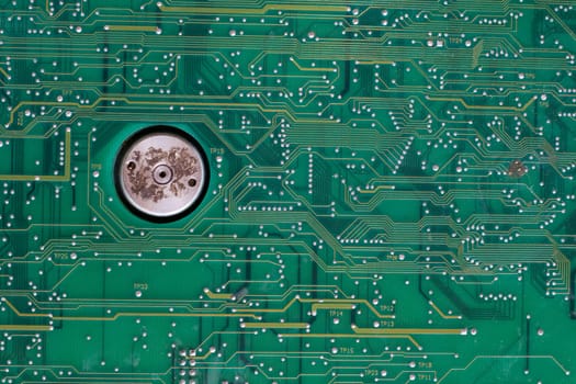 Part of an old green circuit board