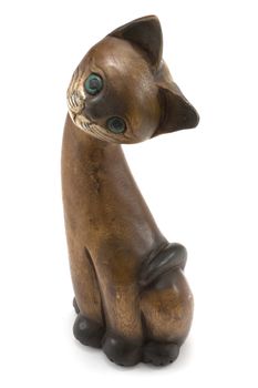 Wooden cat with green eye insulated on white background