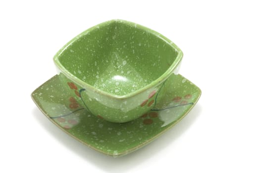 Chinese cup on saucer insulated on white background