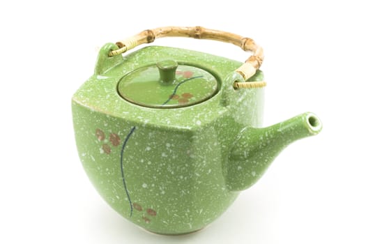 Chinese teapot with bamboo handle insulated on white background