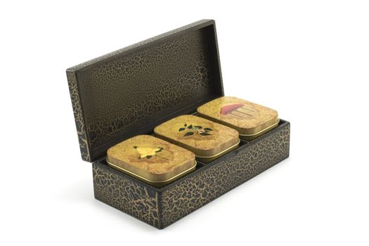 Wooden box with tea insulated not white background