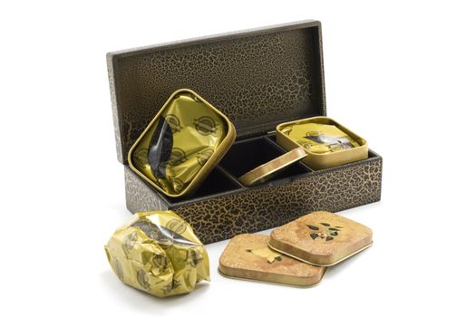 Wooden box with tea insulated not white background