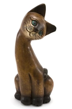 Wooden cat with green eye insulated on white background