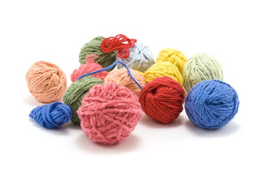 Ball of the colour threads insulated on white background