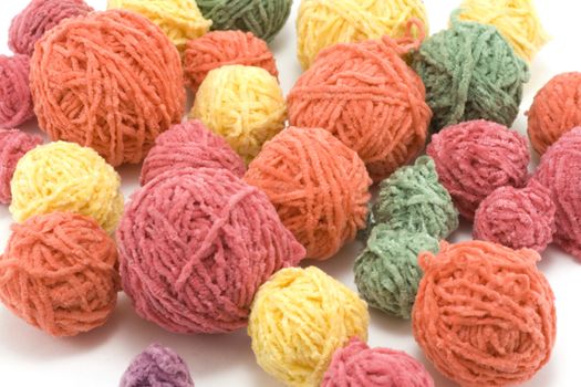 Ball of the colour threads insulated on white background