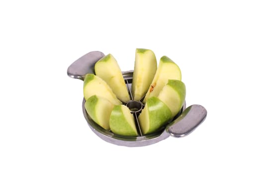 apple cutter and green apple isolated over white background