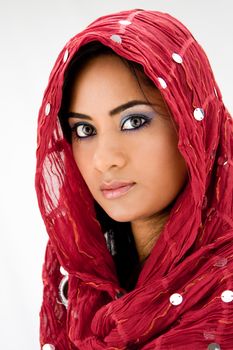 Beautiful woman with red head scarf, isolated