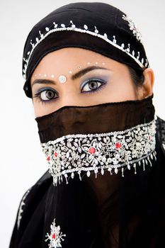 Beautiful gypsy woman with black head scarf, isolated