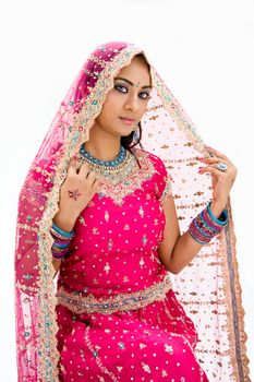 Beautiful Bangali bride in colorful dress and veil, isolated