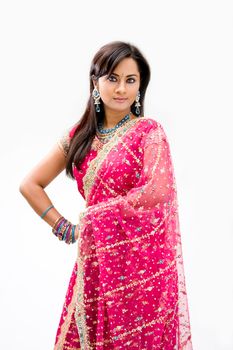 Beautiful Bengali bride in colorful dress, isolated