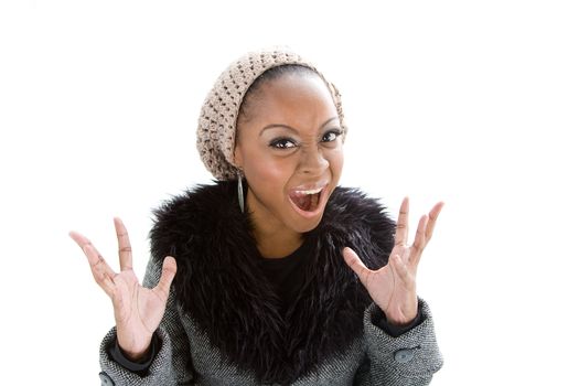 Face of a beautiful African woman wearing gray winter wear, isolated