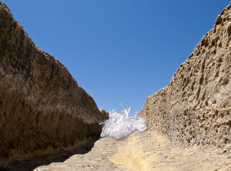 A sudden flash flood fills a dry and arid valley