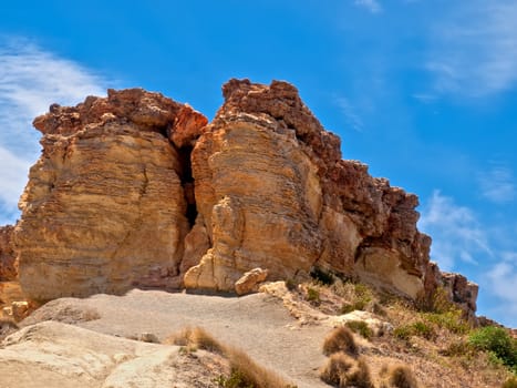 This rocky outcrop is one of the most well known geologic features on the Northern side of the island of Malta. It however is in imminent danger of collapse as it lies on clay sediment, and the fissure running through its centre gets wider every year. 