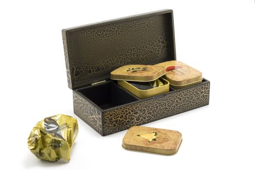 Wooden box with tea insulated not white background