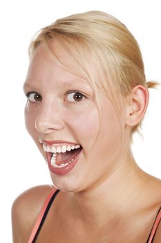 A close-up studio portrait of an attractive blonde young woman. Isolated over white