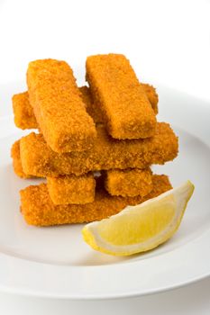 eight fish fingers on a white plate