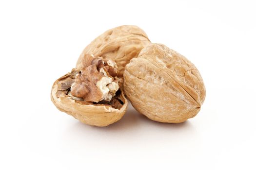 three walnuts isolated on white background