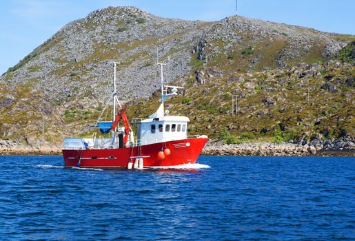 Fishing boat in a fjord of northern Norway