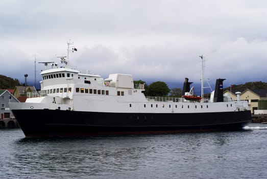 The ferry in a fjord of Norway