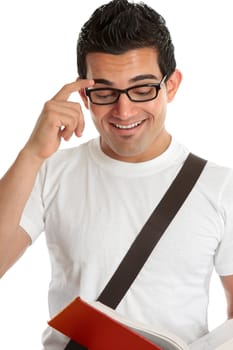 Smiling university or college student or young man reading a book.  White background.