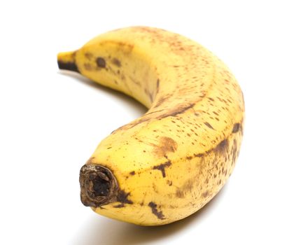 Closeup shot of ripe banana it is isolated on a white background.