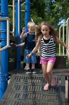 sunny day in the park with children playing