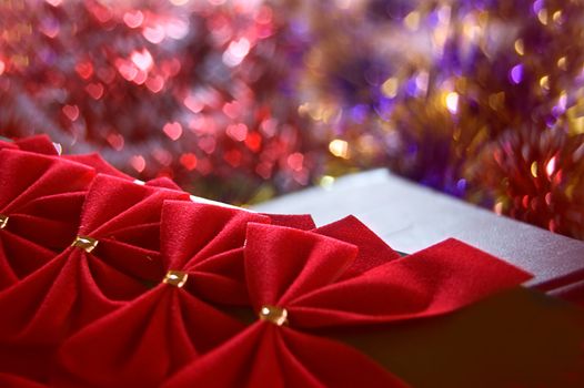 red bows over holiday background