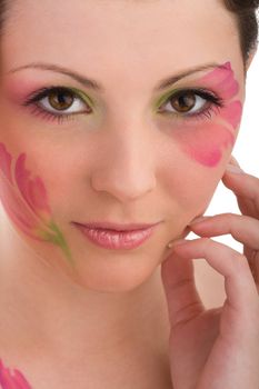 Closeup photo of woman face with painting