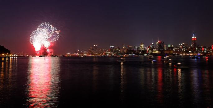 NEW YORK - JULY 4: the Macy's 4th of July fireworks displays on July 4, 2010 over Hudson River