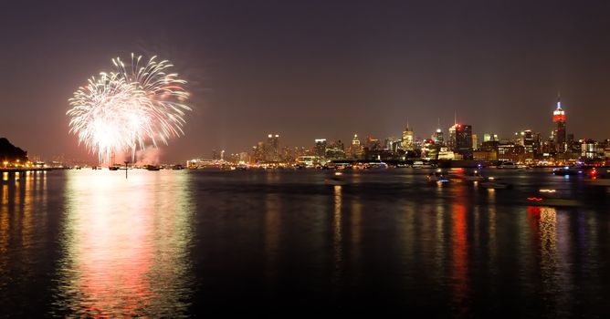 NEW YORK - JULY 4: the Macy's 4th of July fireworks displays on July 4, 2010 over Hudson River