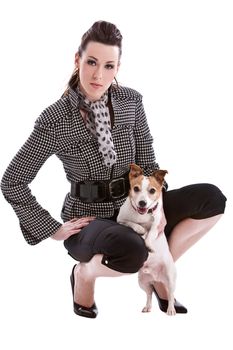 Beautiful woman with her jack russel terrier on white background