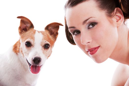 Pretty woman with her jack russel terrier on white background