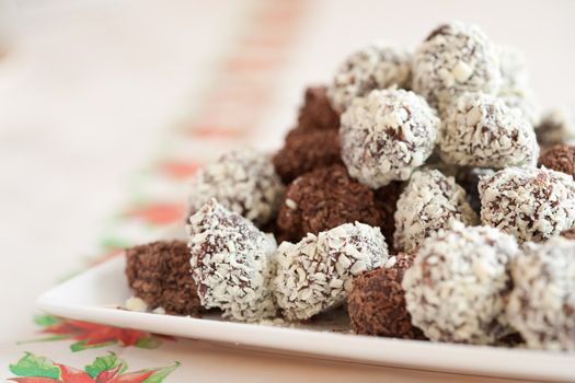 Delicious home made chocolate truffels with white and dark chocolate flakes