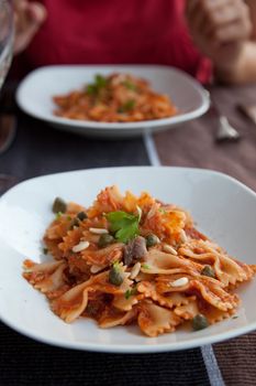 Simple pasta with capers, tuna and tomato sauce