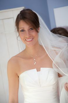 Beautiful bride getting ready for her big day looking radiant