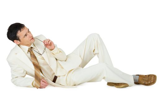 Thinking the young man lies, isolated on a white background