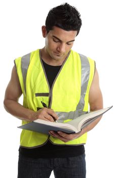 Builder or construction worker writing in a book.  White background.