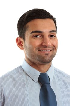 Smiling businessman wearing a blue pinstripe shirt and blue tie.  White background.