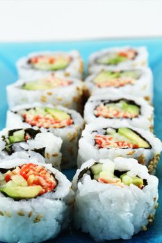 Fresh sushi served on an oriental style tray.