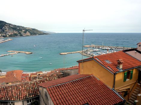 View of Menton port and seaside, south of France, upon the red roofs of the old city