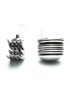 Forks and spoons isolated against a white background