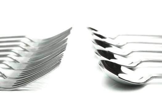 Forks and spoons isolated against a white background