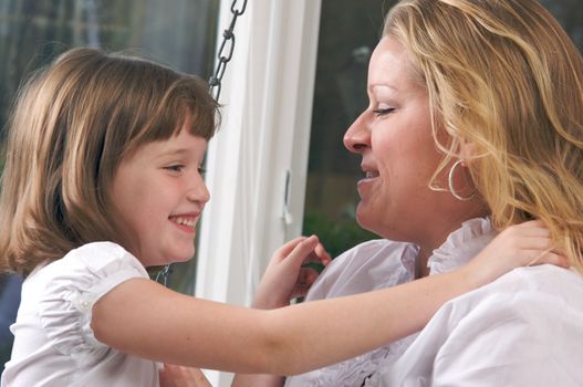 Young Mother and Daughter Enjoying a Personal Moment