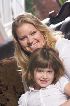 Young Mother and Daughter Enjoying a Personal Moment