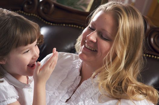 Young Mother and Daughter Enjoying a Personal Moment