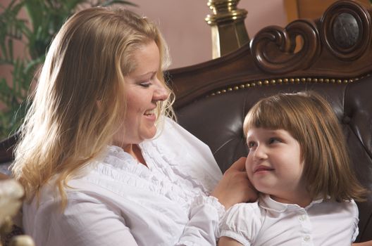 Young Mother and Daughter Enjoying a Personal Moment