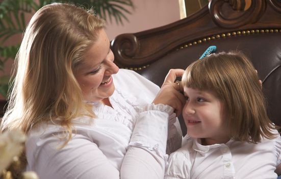 Young Mother and Daughter Enjoying a Personal Moment