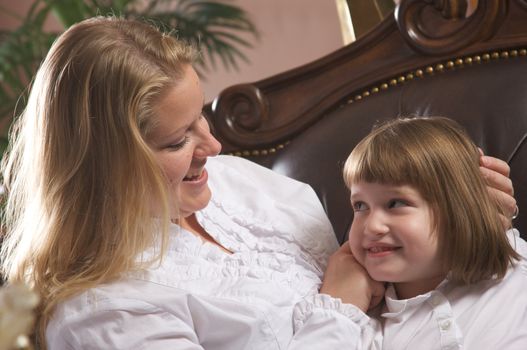 Young Mother and Daughter Enjoying a Personal Moment