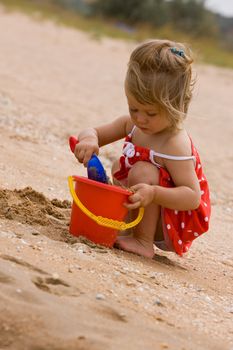 people series: little girl play with sand